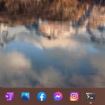 Windows 11 - Taskbar con più elementi rispetto allo spazio disponibile